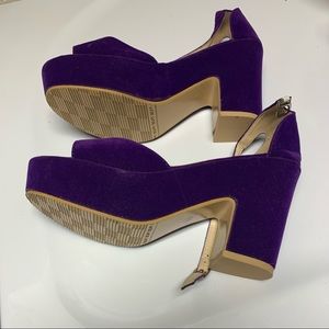 2 inch heels. purple. Size 8.5 USA. Made of suede and leather.